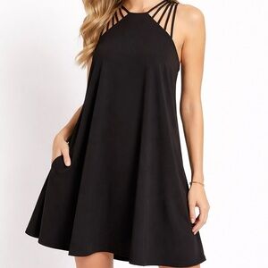 She + Sky Black Strappy Cage
Neck Swing Dress Small | Sleeveless A-Line LBD